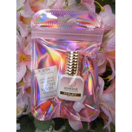 Colle pour extension de cils 0.05 s , colle sechage rapide pour cils .