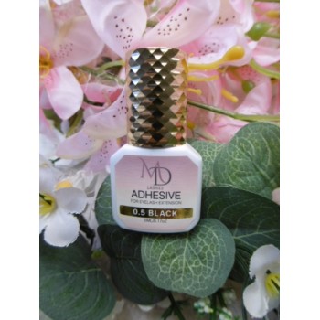 Colle pour extension de cils 0.05 s , colle sechage rapide pour cils .